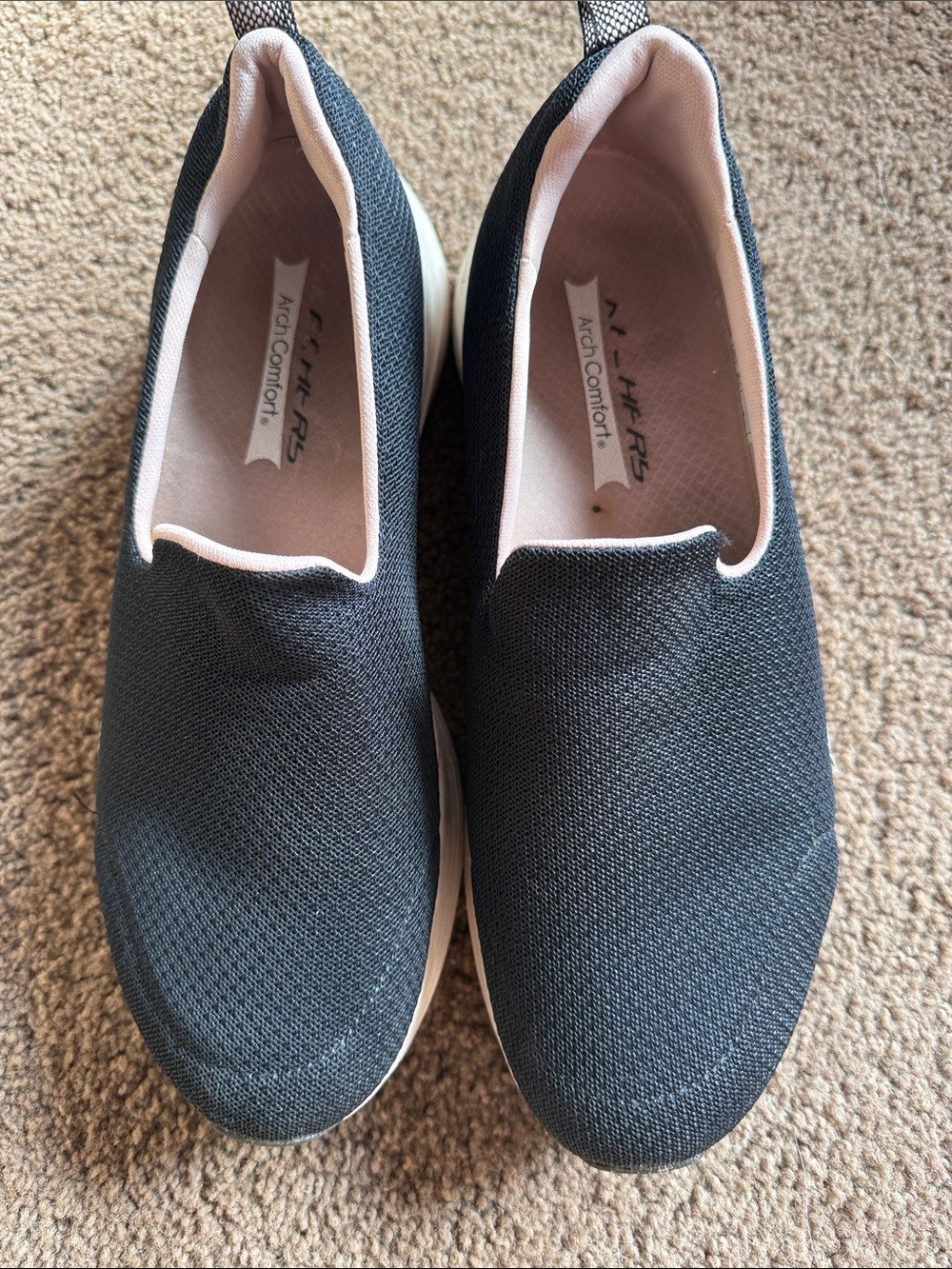 Skechers Black Slip-On Walking Shoes with White Soles